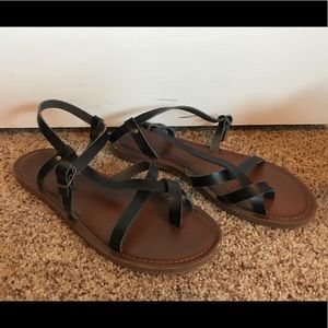 Black strap cross sandals